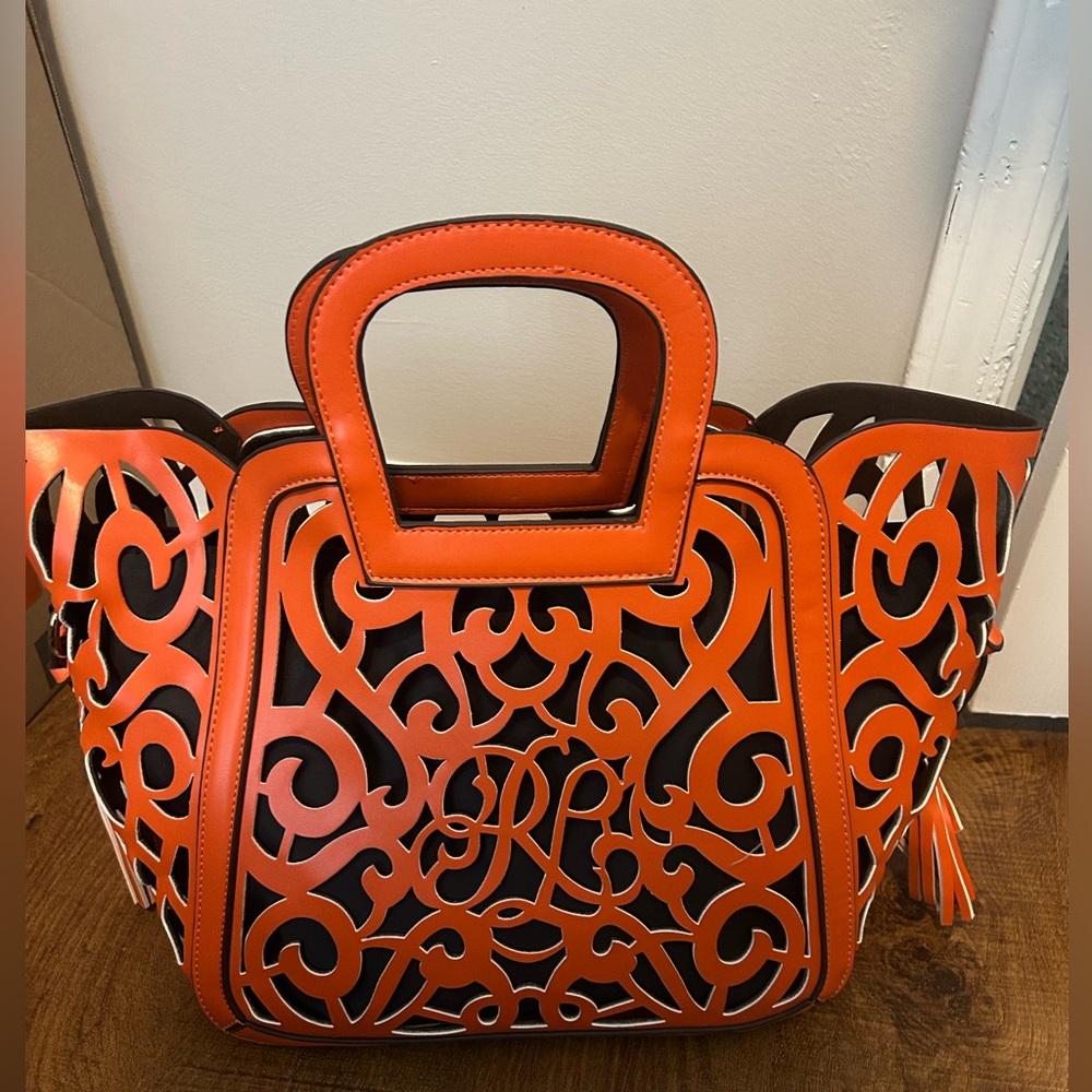 Orange Tote with Intricate Cut-Out Design